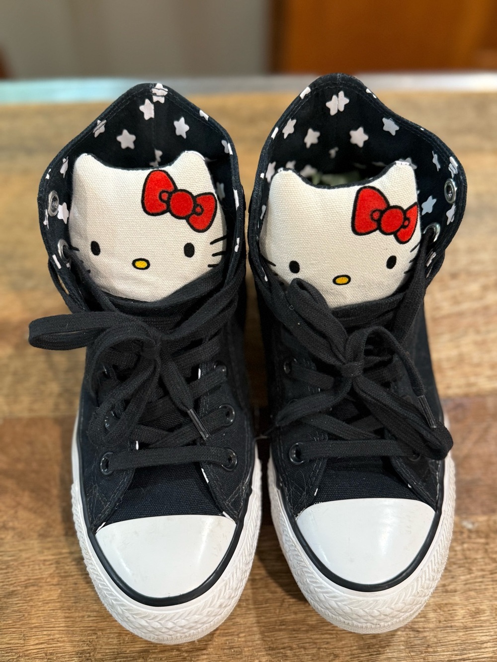 Hello Kitty Black and White High-Top Sneakers with Red Bow Accent